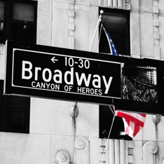 Photo of street sign for 10–30 block of Broadway, “Canyon of Heroes”, in Manhattan