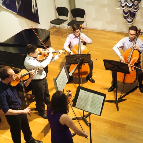 Photo of GVO members performing a string quintet