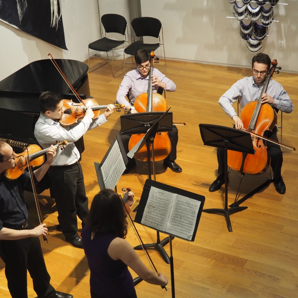 Photo of GVO members performing a string quintet